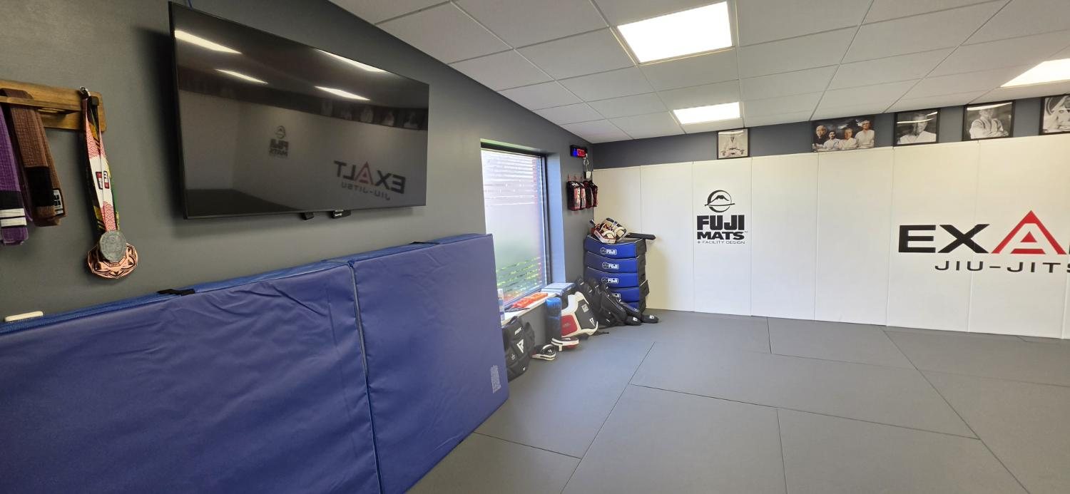 The other side of the Exalt mat room, with the window and crash pads